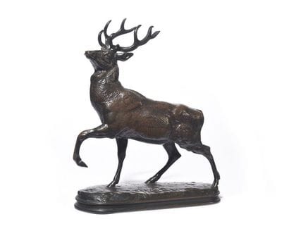 Cerf la jambe levée Épreuve en bronze patiné,...