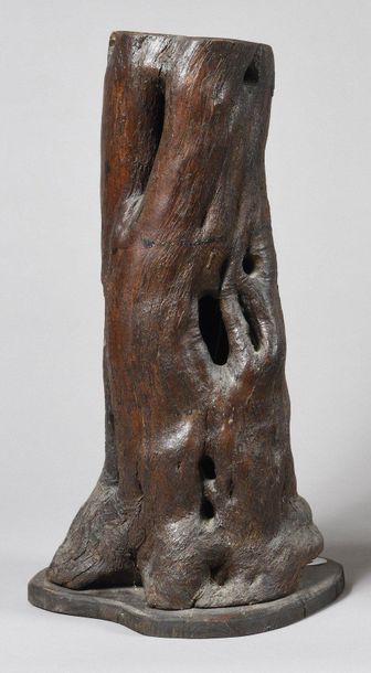 Hollow and openwork tree trunk mounted as...