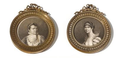 Two black and white medallions. 