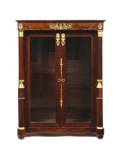 Bookcase in mahogany veneer, it opens with...