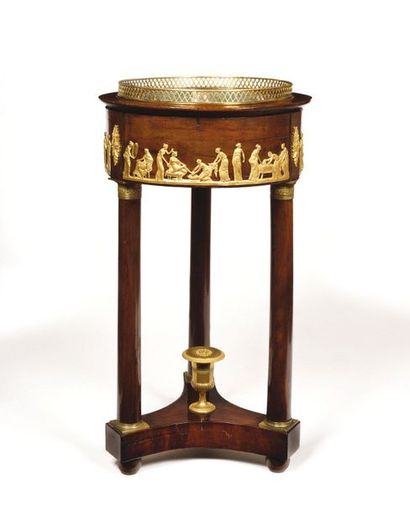 Round planter in mahogany veneer, the band...