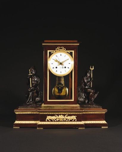 Rare regulator in mahogany veneer and gilded...