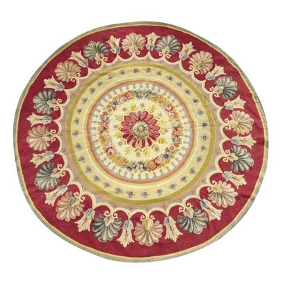 Aubusson Round woollen rug, decorated with...