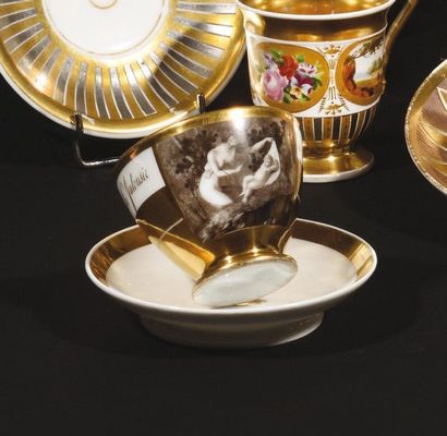 Paris Two porcelain cups and their saucer,...