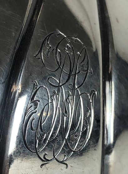 Silver teapot chiselled with wavelets and...