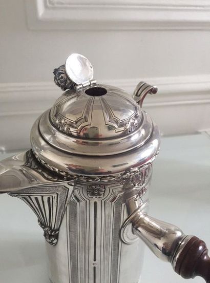 CHOCOLATE silver chiselled with floral frames...