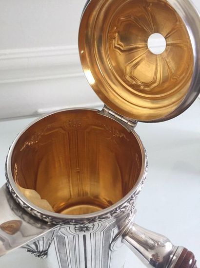 CHOCOLATE silver chiselled with floral frames...