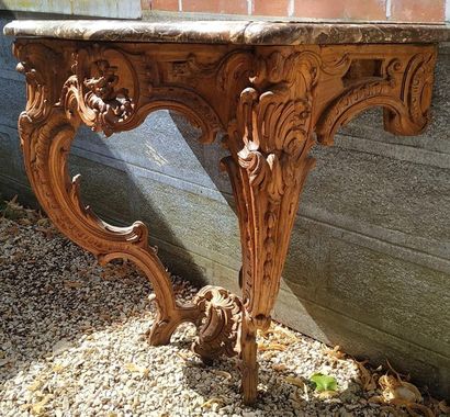 CONSOLE de forme mouvementée en bois naturel...