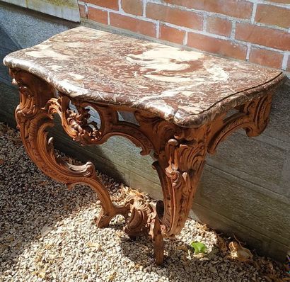 CONSOLE de forme mouvementée en bois naturel...