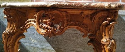 CONSOLE de forme mouvementée en bois naturel...