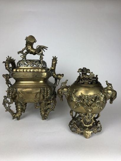 JAPAN Two perfume burners in patinated bronze...