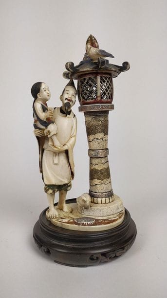JAPAN Carved and polychromed ivory group...