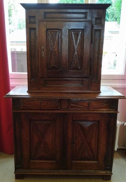 
CABINET in two bodies in walnut with a strongly...
