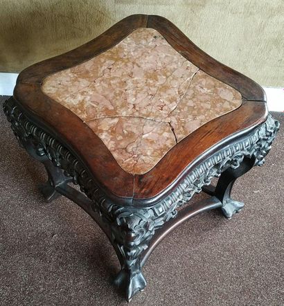 CHINA A hardwood and patinated selette, the...