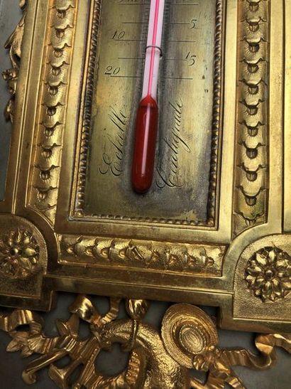 THERMOMETER in chased and gilt bronze with...