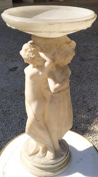 GROUP in alabaster carved with decoration...