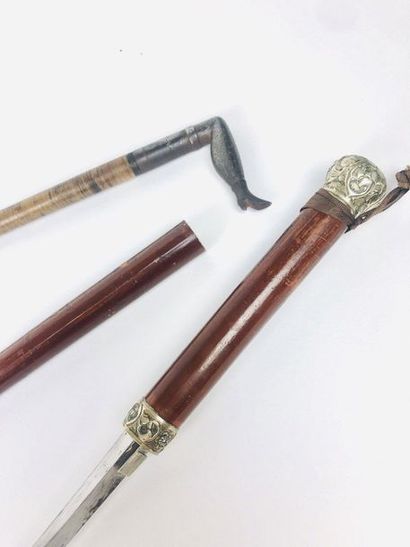 Set of TWO CANNES, one dagger and the other...