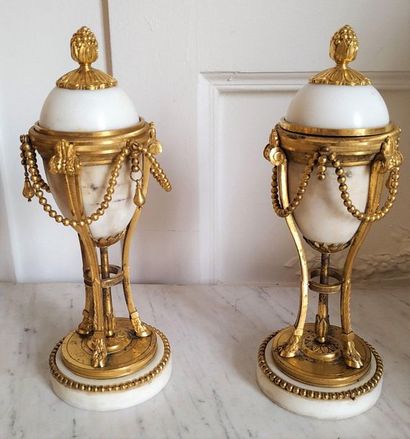 PAIR OF CASSOLETTES forming candlesticks...