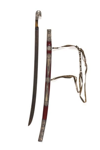 CHACHKA 

Handle in horn and chiselled silver....