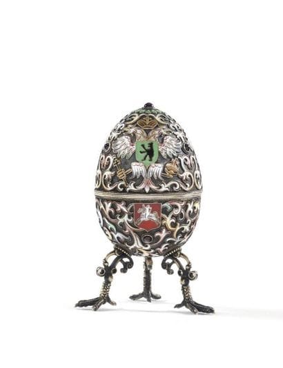 Egg-shaped box 

Decorated with the coats...