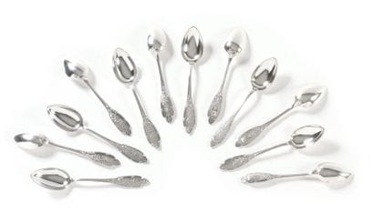 12 DESSERT SPOONS

Decorated with coats of...