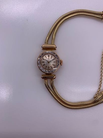 OMEGA About 1980/1990. Ladies' watch in yellow...