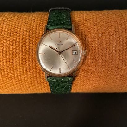 OMEGA Ref: 1323004. Circa 1960. Yellow gold...