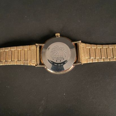 ENICAR Gold-plated wristwatch. Marbled brown...