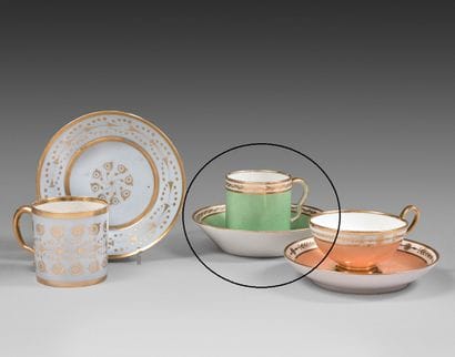 PARIS A porcelain cup and saucer decorated...