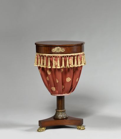 A mahogany and mahogany veneer drum-shaped...