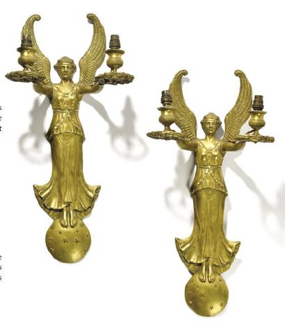 Pair of two-light gilt bronze sconces representing...