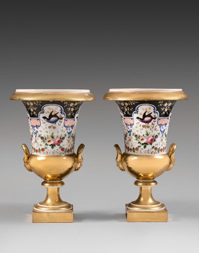 PARIS A pair of Medici porcelain vases with...