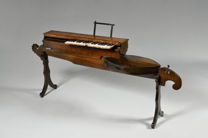A carved and varnished wood MONOCORDE DE...