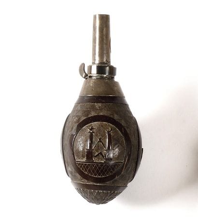 POWDER POT Small coconut carved with three...