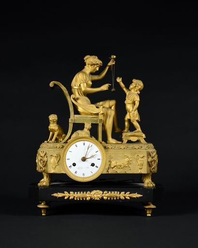
PENDULE représentant « la leçon de bilboquet»,...