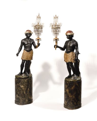 
Pair of gilded and polychrome wood TORCHERES...