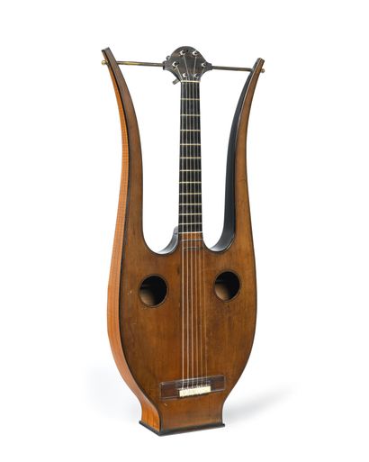 
LIGHT GUITAR in lemon tree and spruce top...