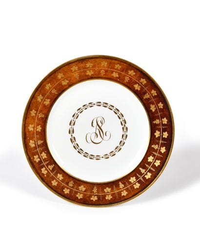 SÈVRES Porcelain plate with gold decoration...