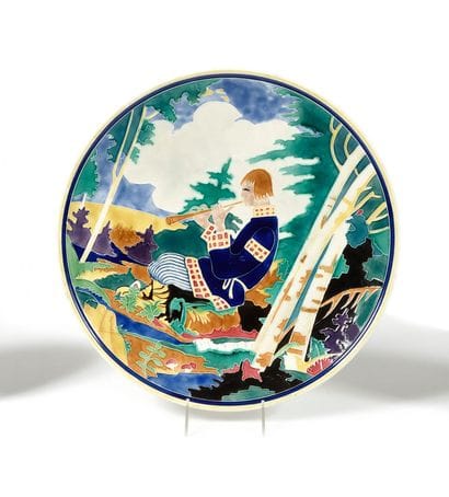 PLAT « Joueur de flutiau »

Faïence émaillée

Marque...
