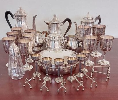 SET OF SILVER METAL PIECES including: 10...