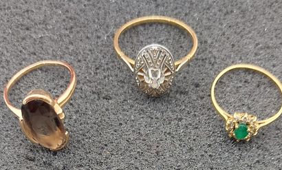 SET 

composed of three rings in 18K gold...