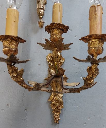 TWO PAIRS OF APPLIQUES in gilded and chased...