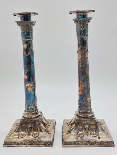 PAIR OF silver-plated CANDLES in the form...