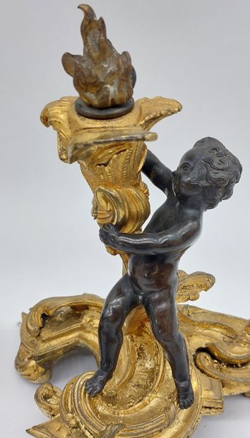 PAIRE DE BOUGEOIRS in chased and gilt bronze...