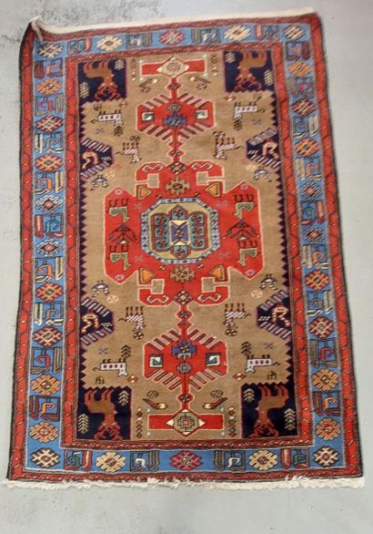THREE HAND-MADE WOLF RUGS FROM THE EAST
-...
