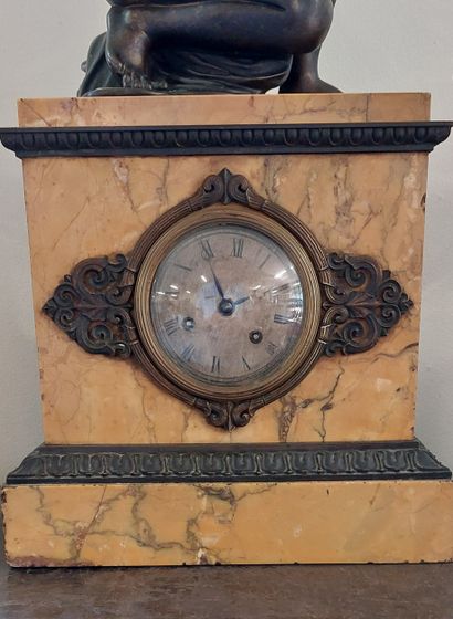 Mantelpiece including a chased marble clock...