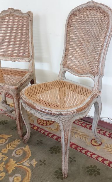 TWO CHAIRS in lacquered, carved and moulded...