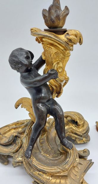 PAIRE DE BOUGEOIRS in chased and gilt bronze...