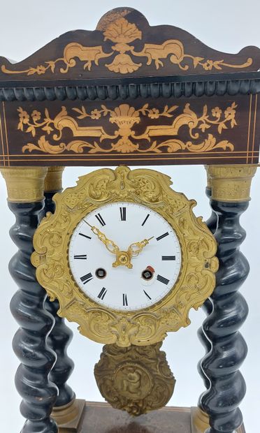 PENDULE in blackened wood decorated with...