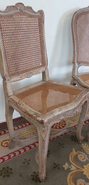 TWO CHAIRS in lacquered, carved and moulded...
